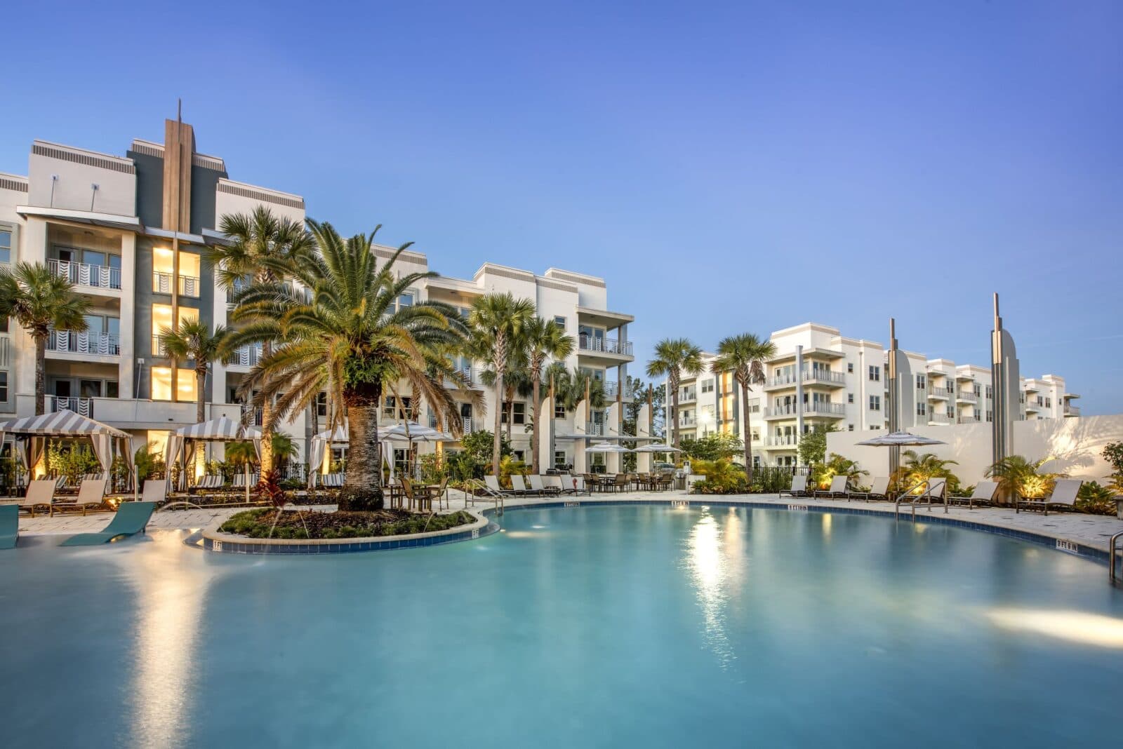 Institutional-quality multifamily property at dusk
